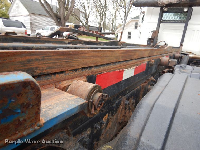 image for item JS9538 1999 Volvo WG  roll-off container truck