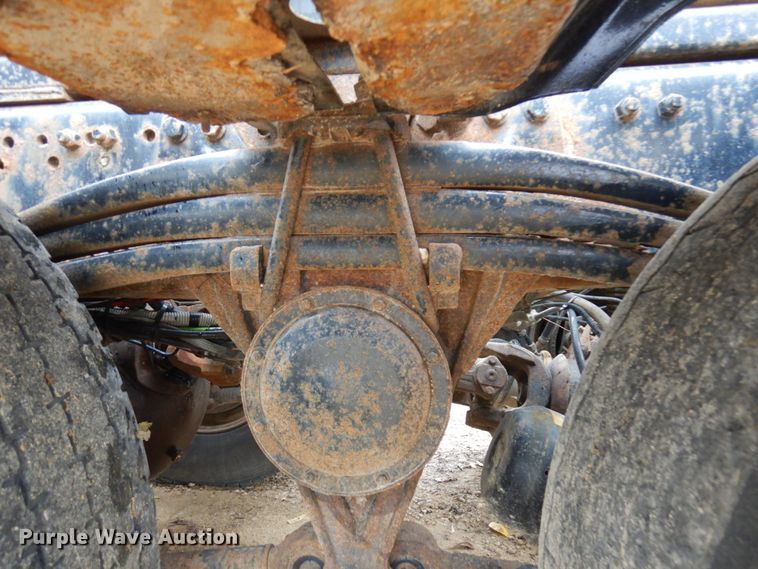 image for item JS9538 1999 Volvo WG  roll-off container truck