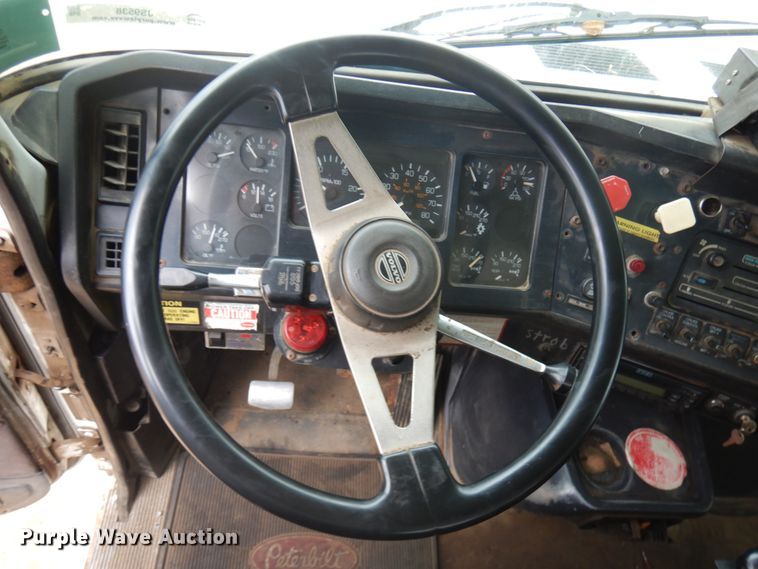 image for item JS9538 1999 Volvo WG  roll-off container truck