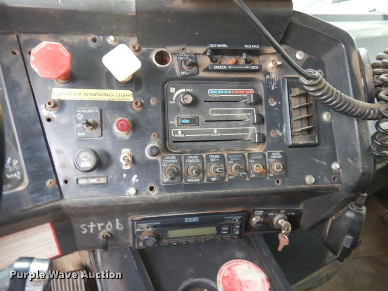 image for item JS9538 1999 Volvo WG  roll-off container truck