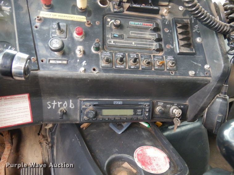 image for item JS9538 1999 Volvo WG  roll-off container truck