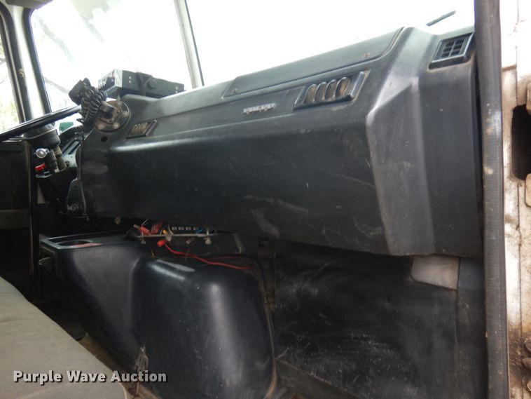 image for item JS9538 1999 Volvo WG  roll-off container truck