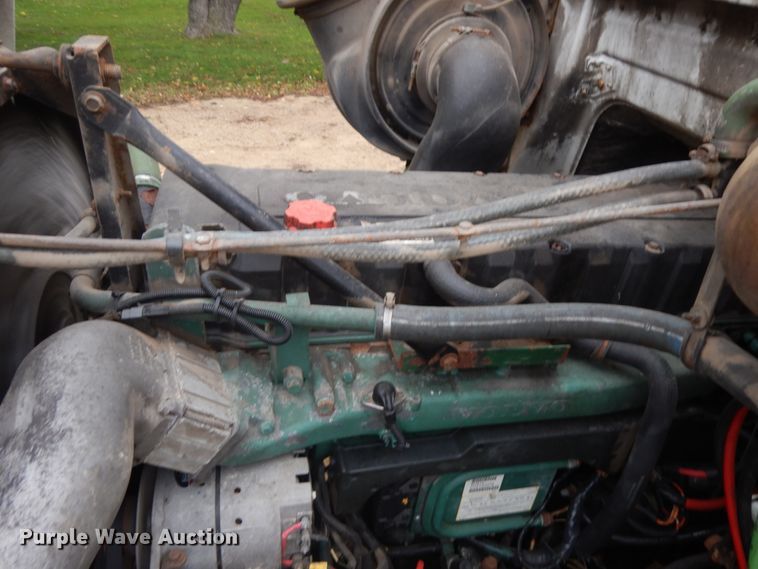 image for item JS9538 1999 Volvo WG  roll-off container truck