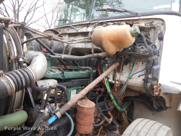 image for item JS9538 1999 Volvo WG  roll-off container truck