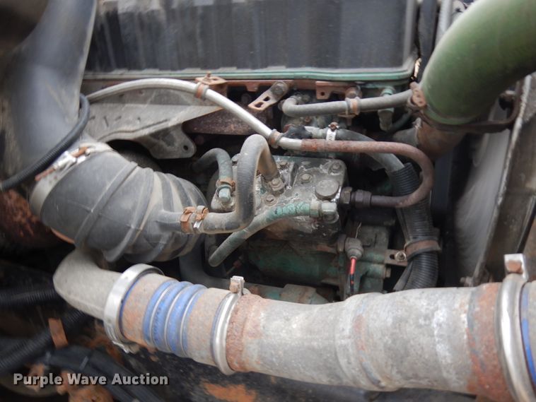 image for item JS9538 1999 Volvo WG  roll-off container truck