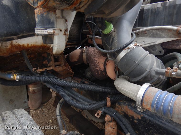 image for item JS9538 1999 Volvo WG  roll-off container truck