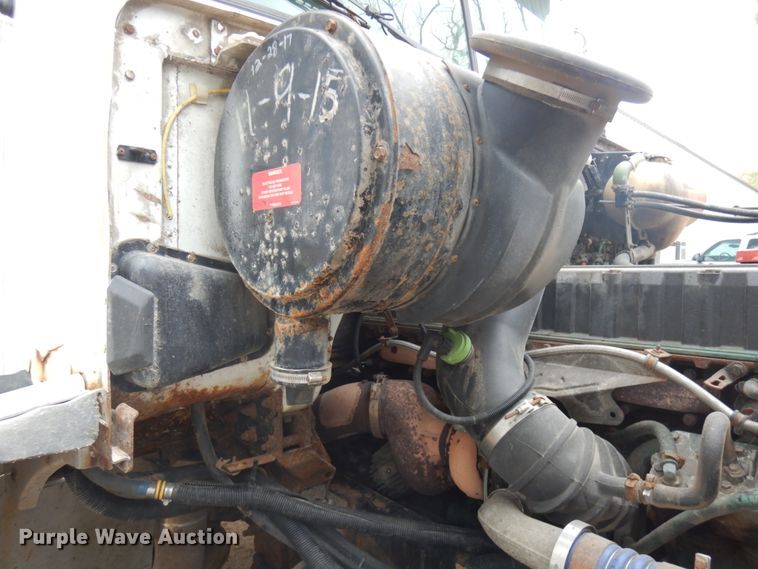 image for item JS9538 1999 Volvo WG  roll-off container truck