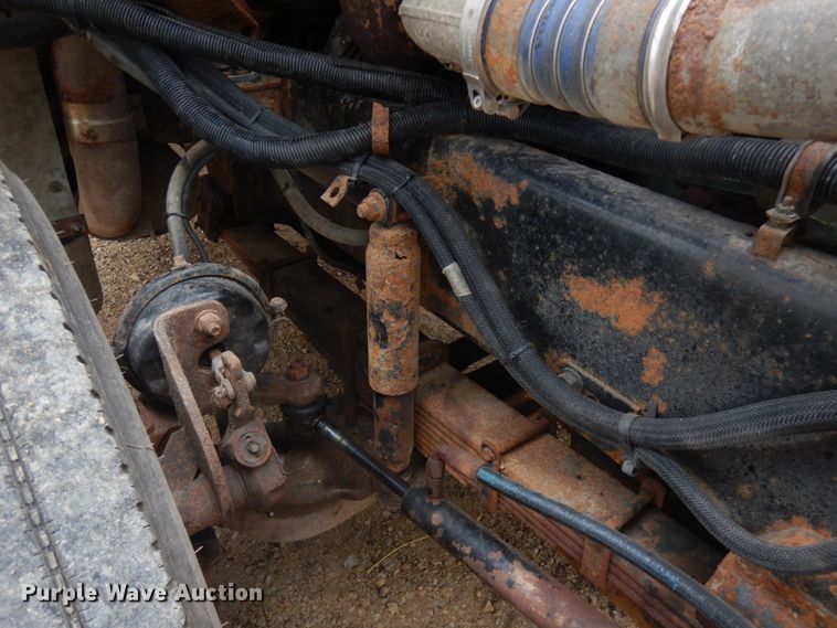 image for item JS9538 1999 Volvo WG  roll-off container truck