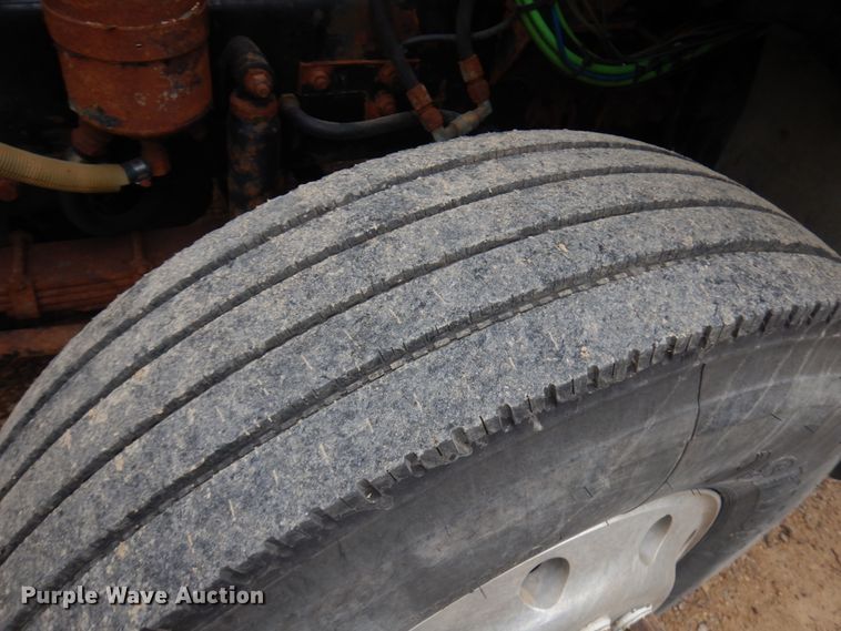 image for item JS9538 1999 Volvo WG  roll-off container truck