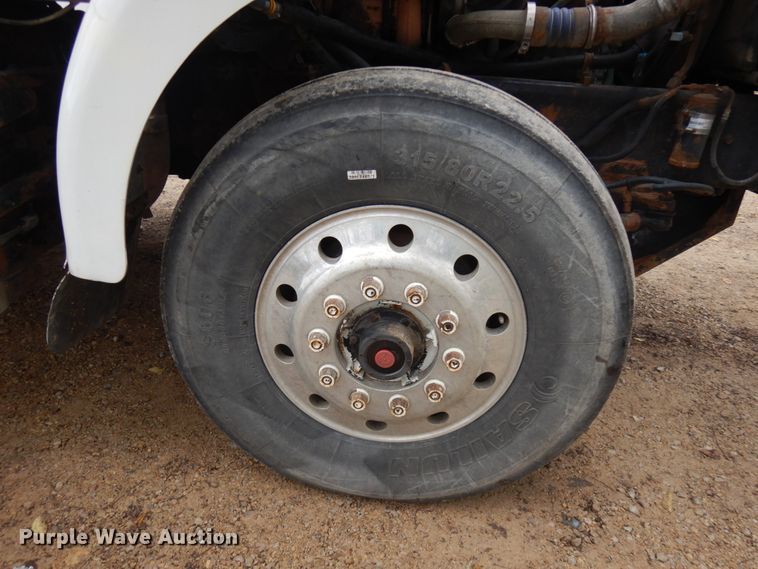 image for item JS9538 1999 Volvo WG  roll-off container truck