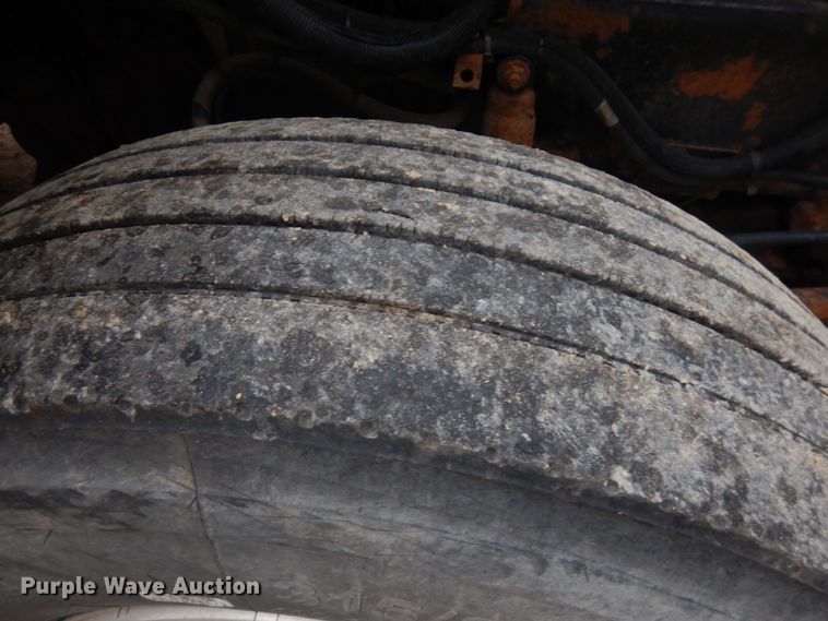 image for item JS9538 1999 Volvo WG  roll-off container truck