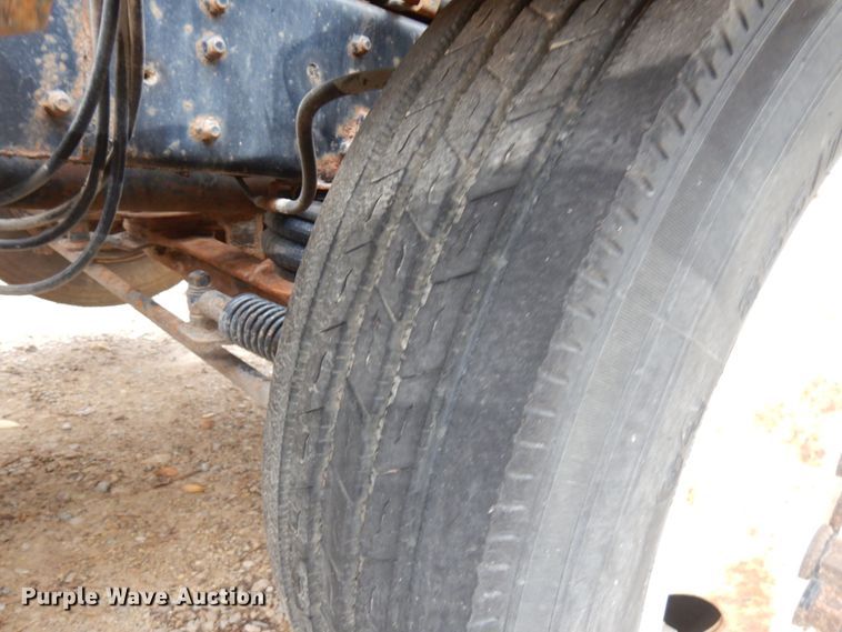 image for item JS9538 1999 Volvo WG  roll-off container truck