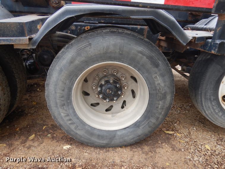 image for item JS9538 1999 Volvo WG  roll-off container truck