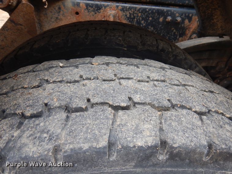 image for item JS9538 1999 Volvo WG  roll-off container truck