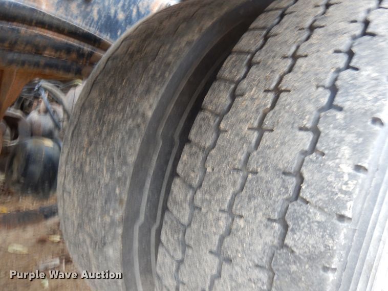 image for item JS9538 1999 Volvo WG  roll-off container truck