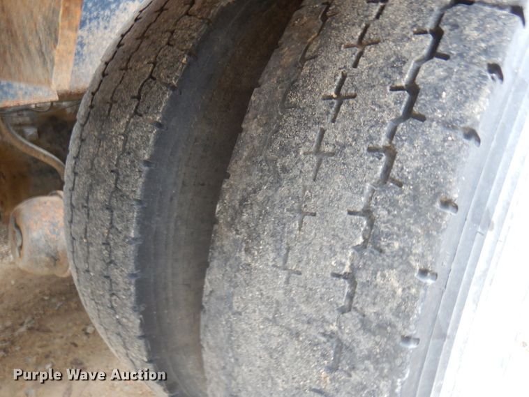 image for item JS9538 1999 Volvo WG  roll-off container truck