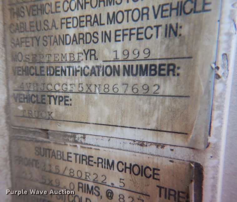 image for item JS9538 1999 Volvo WG  roll-off container truck