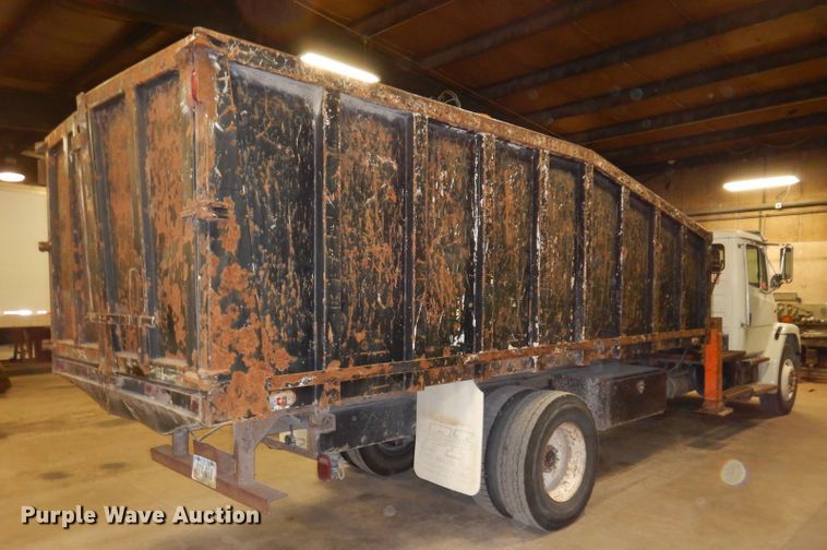 image for item KY9673 2001 Freightliner FL70  grapple truck