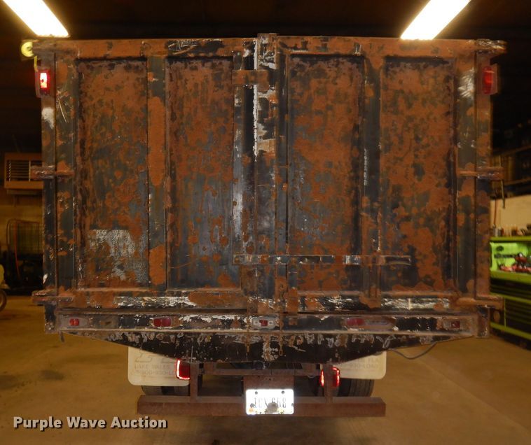 image for item KY9673 2001 Freightliner FL70  grapple truck