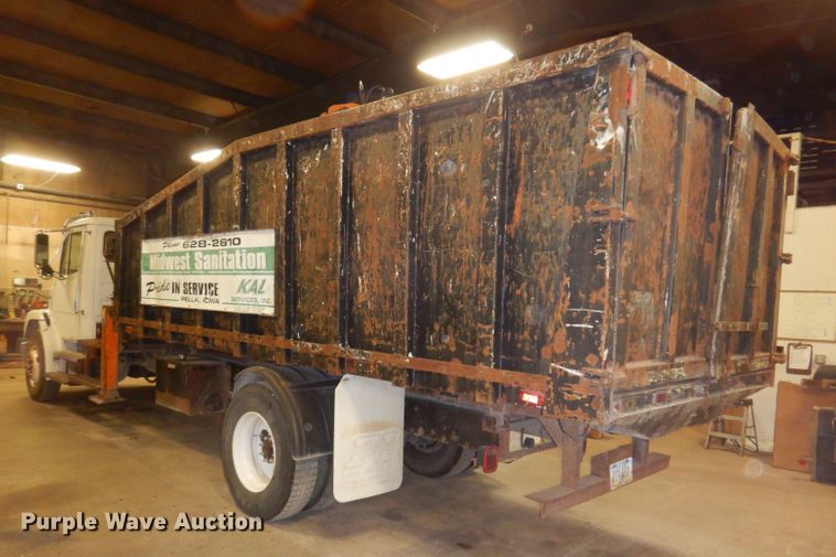 image for item KY9673 2001 Freightliner FL70  grapple truck