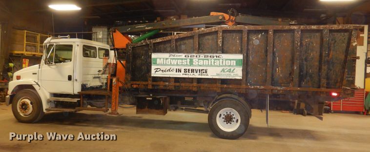 image for item KY9673 2001 Freightliner FL70  grapple truck