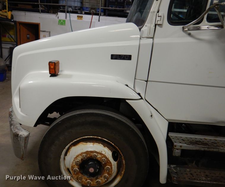 image for item KY9673 2001 Freightliner FL70  grapple truck