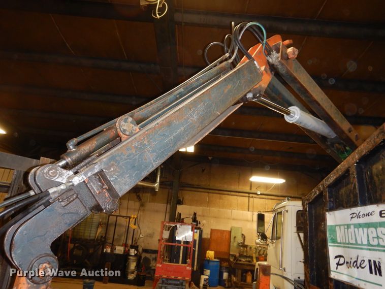 image for item KY9673 2001 Freightliner FL70  grapple truck