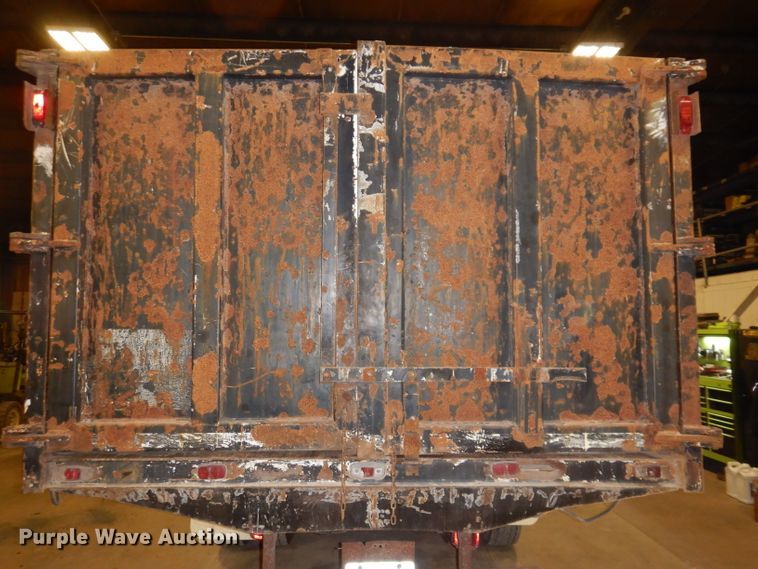 image for item KY9673 2001 Freightliner FL70  grapple truck