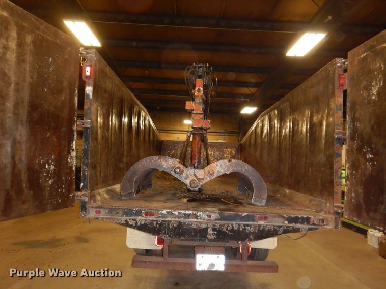 image for item KY9673 2001 Freightliner FL70  grapple truck