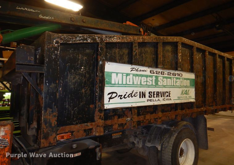 image for item KY9673 2001 Freightliner FL70  grapple truck