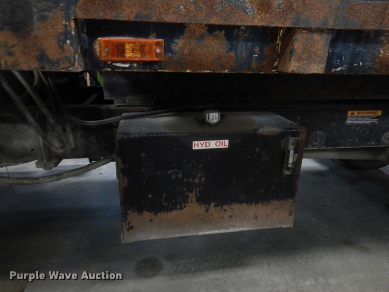 image for item KY9673 2001 Freightliner FL70  grapple truck