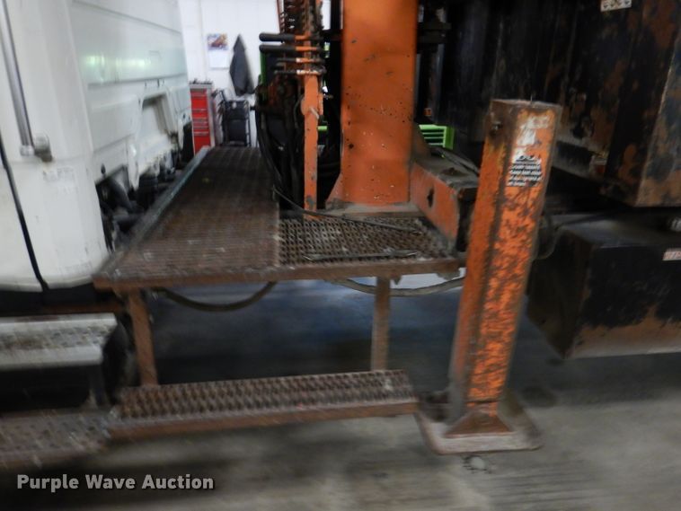 image for item KY9673 2001 Freightliner FL70  grapple truck