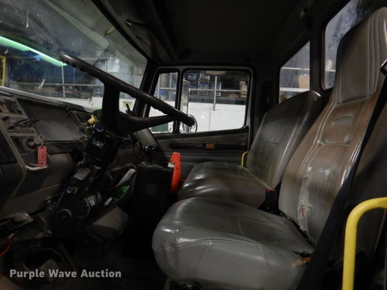 image for item KY9673 2001 Freightliner FL70  grapple truck