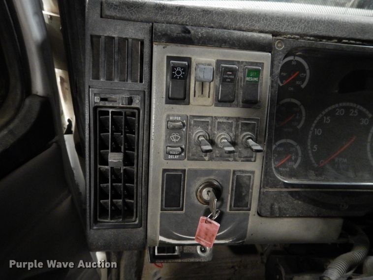 image for item KY9673 2001 Freightliner FL70  grapple truck