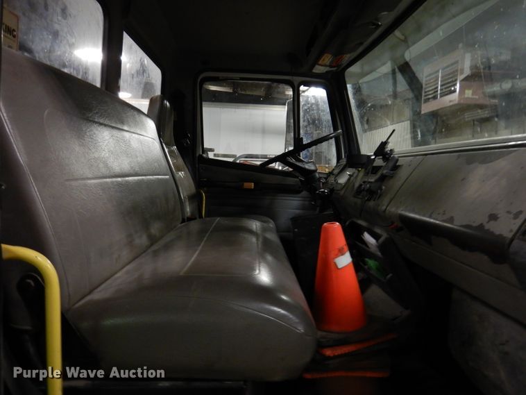 image for item KY9673 2001 Freightliner FL70  grapple truck