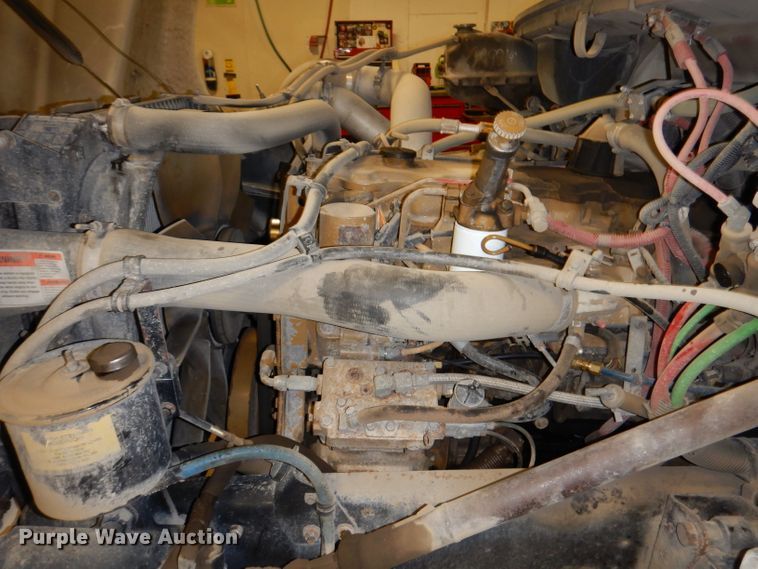 image for item KY9673 2001 Freightliner FL70  grapple truck