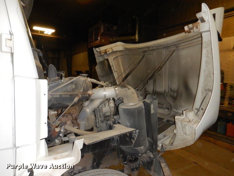 image for item KY9673 2001 Freightliner FL70  grapple truck