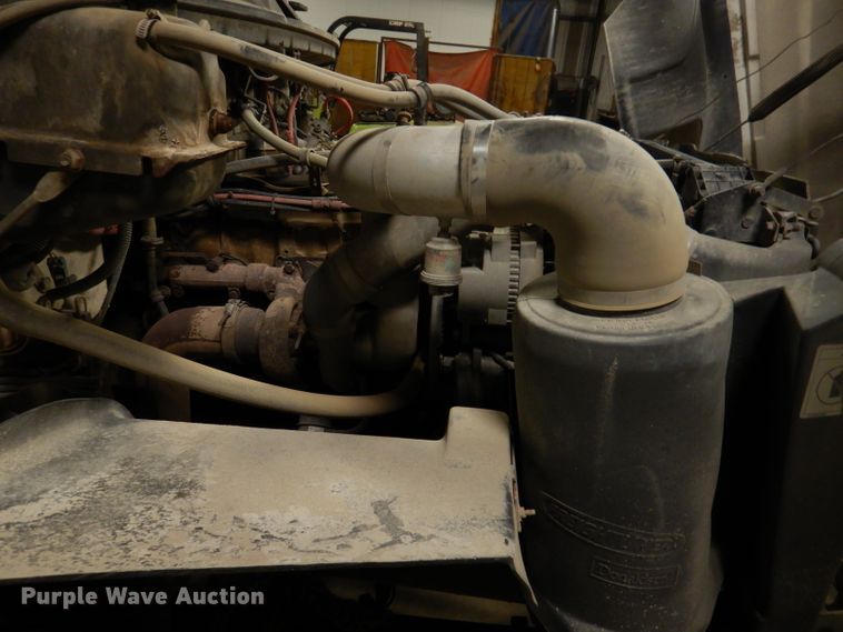 image for item KY9673 2001 Freightliner FL70  grapple truck