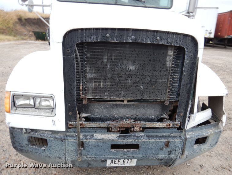 image for item KY9674 1992 Freightliner FLD112  grapple truck