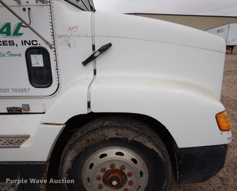 image for item KY9674 1992 Freightliner FLD112  grapple truck