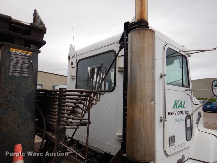 image for item KY9674 1992 Freightliner FLD112  grapple truck