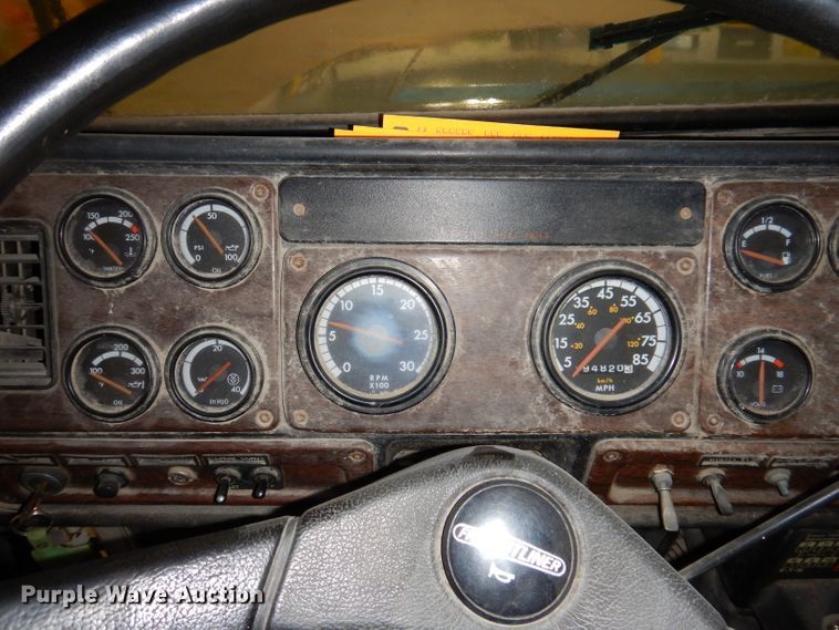 image for item KY9674 1992 Freightliner FLD112  grapple truck