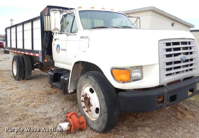 image for item DK3028 1998 Ford F700  dump flatbed truck