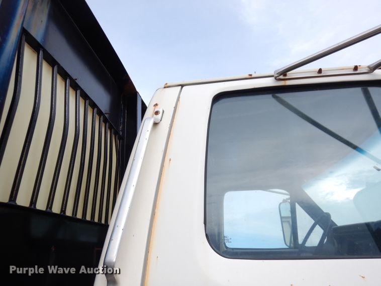 image for item DK3028 1998 Ford F700  dump flatbed truck