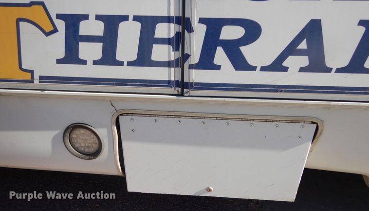 image for item KO9168 2009 Ford E450 Super Duty  shuttle bus