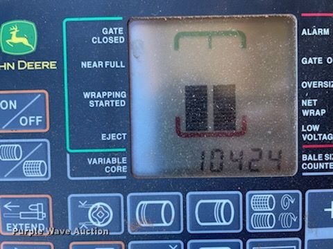 image for item DN0006 John Deere 569  round baler