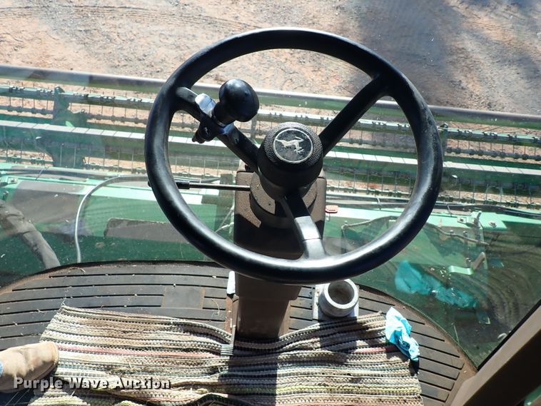 image for item DN0015 2006 John Deere 4895  windrower