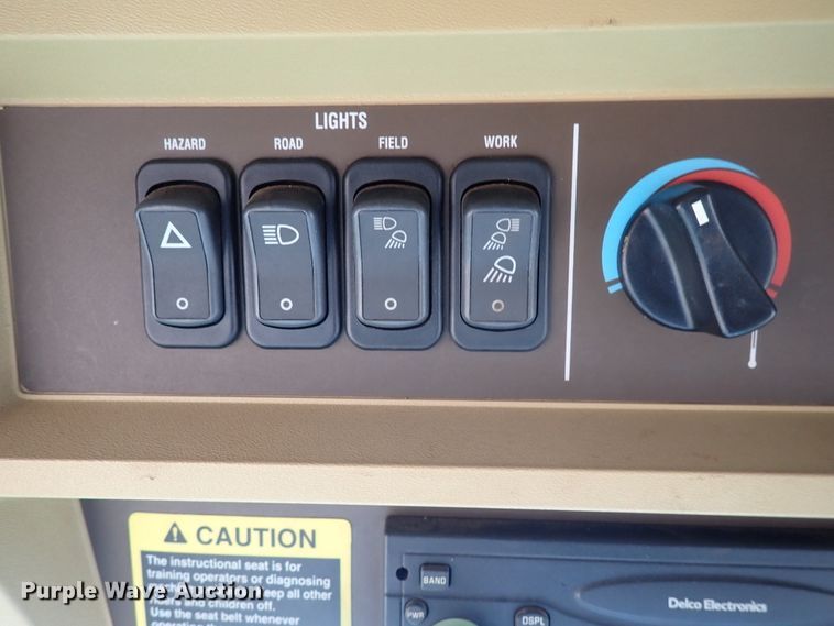 image for item DN0015 2006 John Deere 4895  windrower