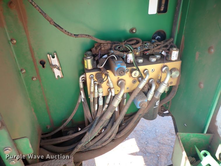 image for item DN0015 2006 John Deere 4895  windrower