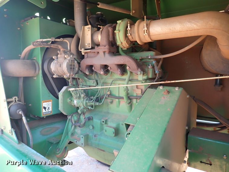 image for item DN0015 2006 John Deere 4895  windrower